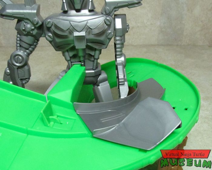 shredder's hand in place
