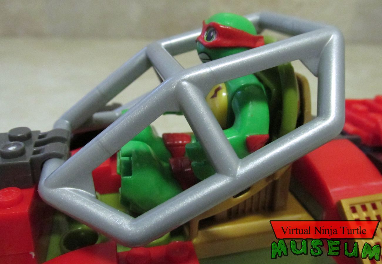 Raph in Shell Cycle side view