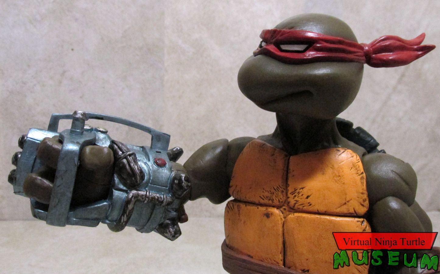 Donatello holding gravity gun 2