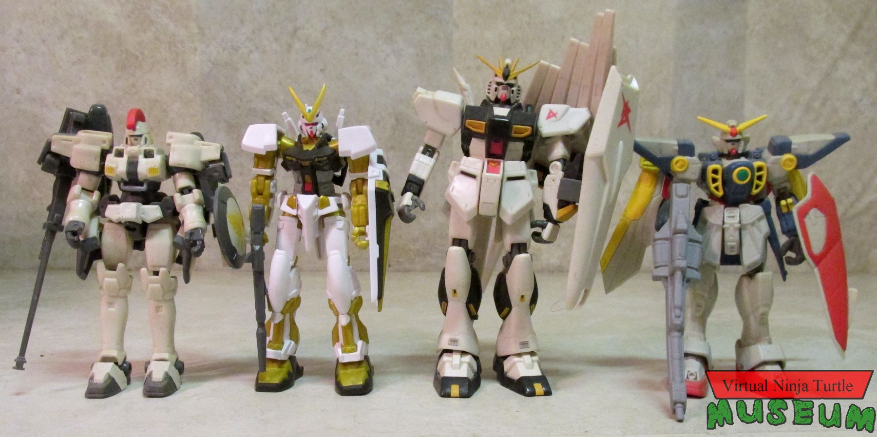 Infinity Gundam Gold Astray with MSIA Tallgeese, Nu Gundam and Wing Gundam