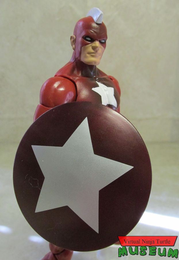 Red Guardian holding shield