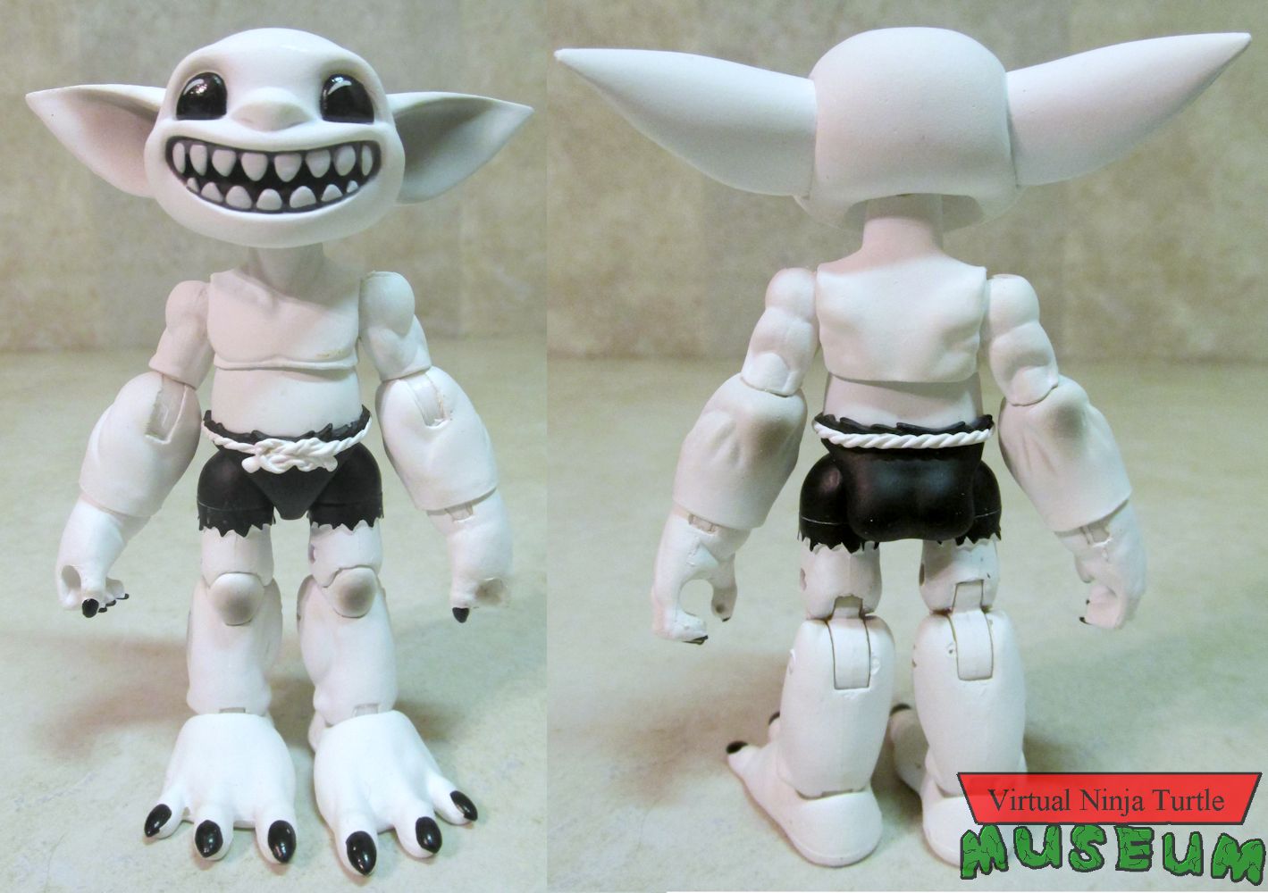 Feral Zombone front and back
