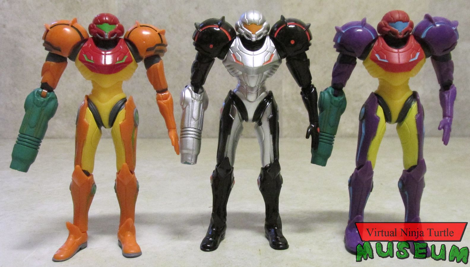 Phazon Suit Samus, Gravity Suit Samus and regular Samus