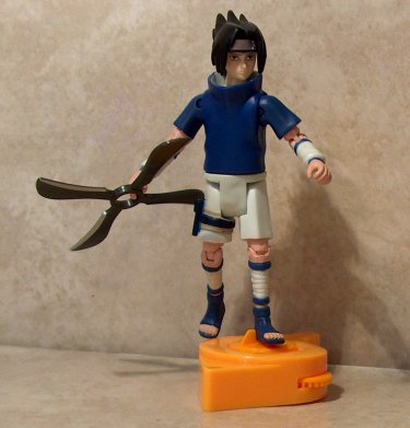 Sasuke with weapons
